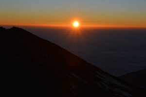 David Thuo Climbing Mt Kilimanjaro sun set
